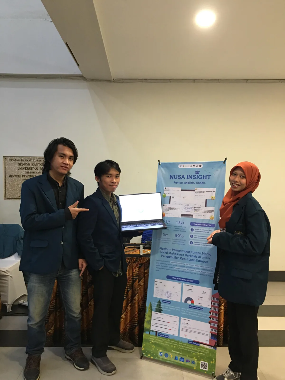 me and my teammates presenting the Nusa Insight AI monitoring project