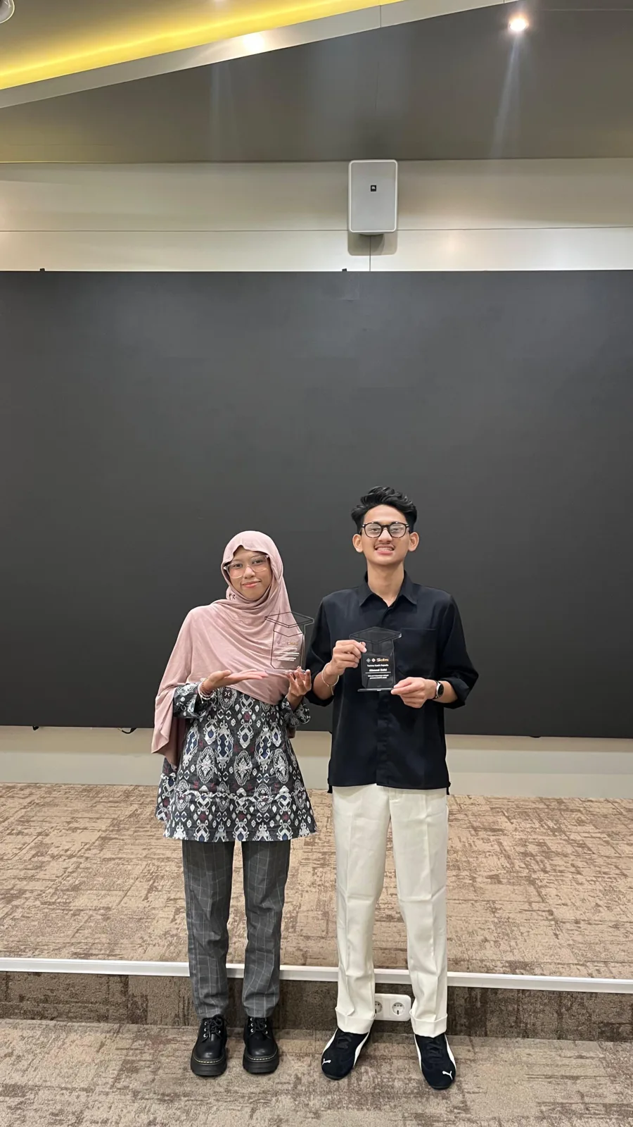 me and my friend with our appreciation after got invited by HMDTIF FILKOM UB to be a guest speaker at their scholarship talks event